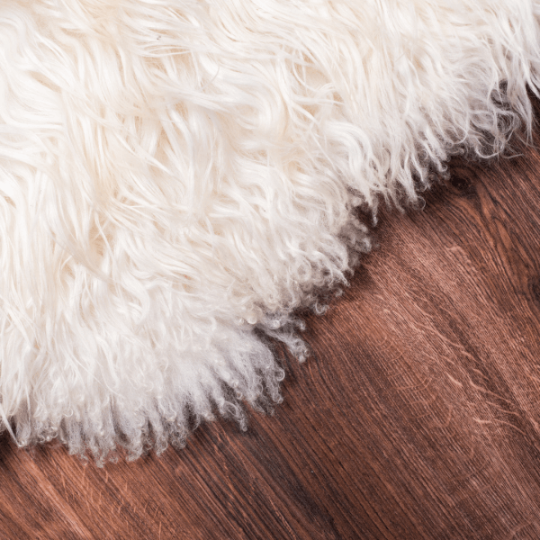 A fluffy rug laid over underfloor heating